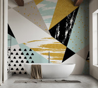 Dynamic abstract triangle mural with infused artistic shapes in bathroom.
