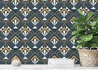 Decorative abstract vintage Deco wallpaper pattern style behind green plant.