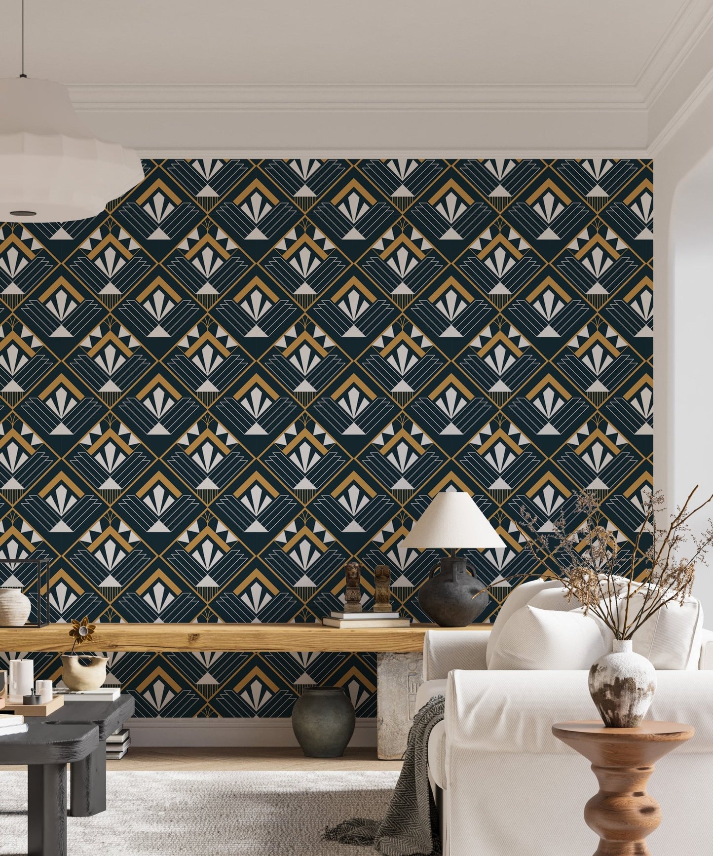 Patterned abstract wallpaper with gold accents in a living space with a white lamp.