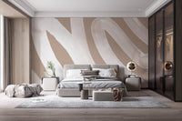 Abstract white waves wall mural adding elegance to bedroom.
