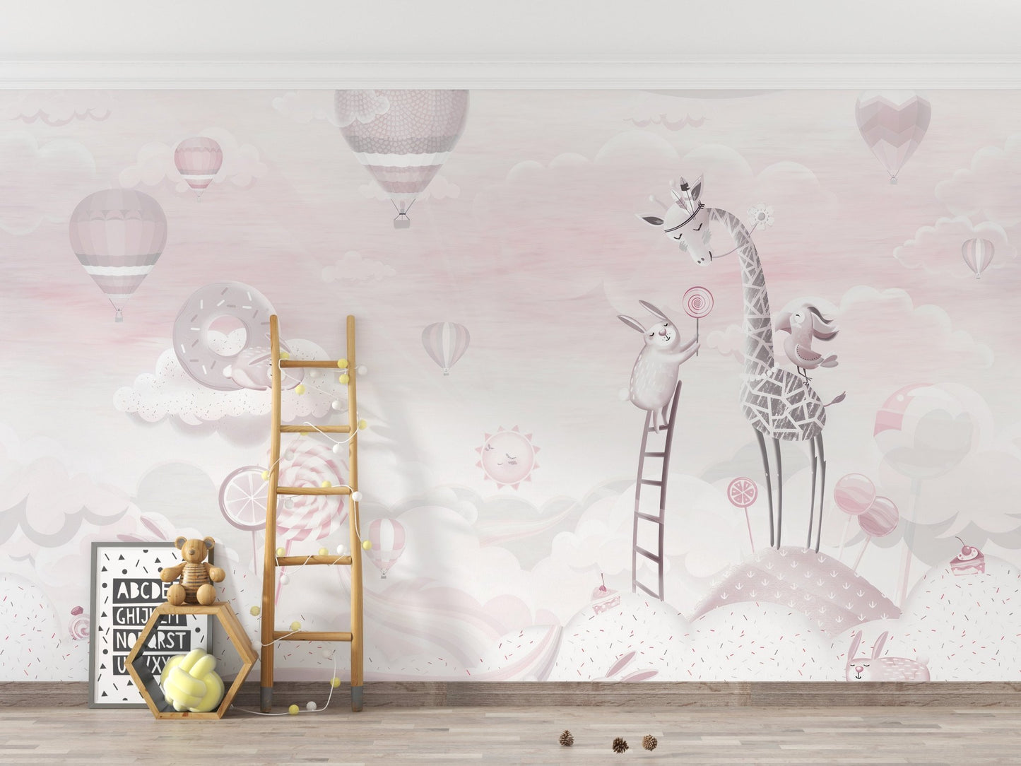 Nursery room featuring a animal on a ladder wall mural in soft pink tone.