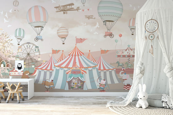 Whimsical pink circus mural for lively playroom walls
