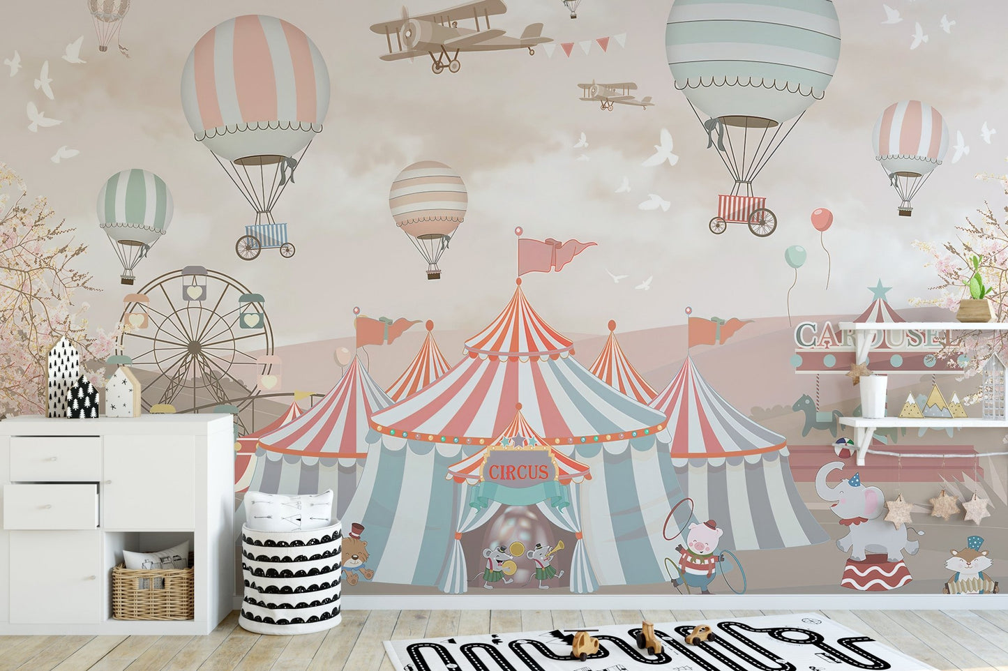 Delightful pink circus mural for playful nursery spaces.