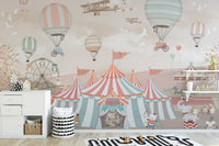Delightful pink circus mural for playful nursery spaces.