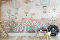 Cheerful pink circus parade wall mural design in kids study area.