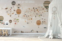 Neutral toned world map wall mural with a white canopy tent.