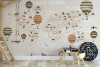 Adventurous Animals Map Wall Murals behind a wood table and chairs.