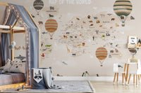 Kids' bedroom with a bunk bed and animal map wall mural backdrop.