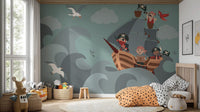 Kids pirate ship wallpaper mural with skull flag and sea birds.
