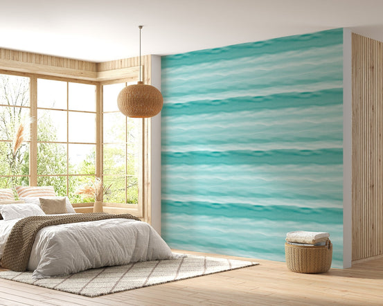 Aegean teal blue wavy stripe wallpaper in a bright bedroom