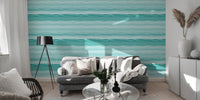 Horizontal teal stripe wallpaper in a modern living room setting