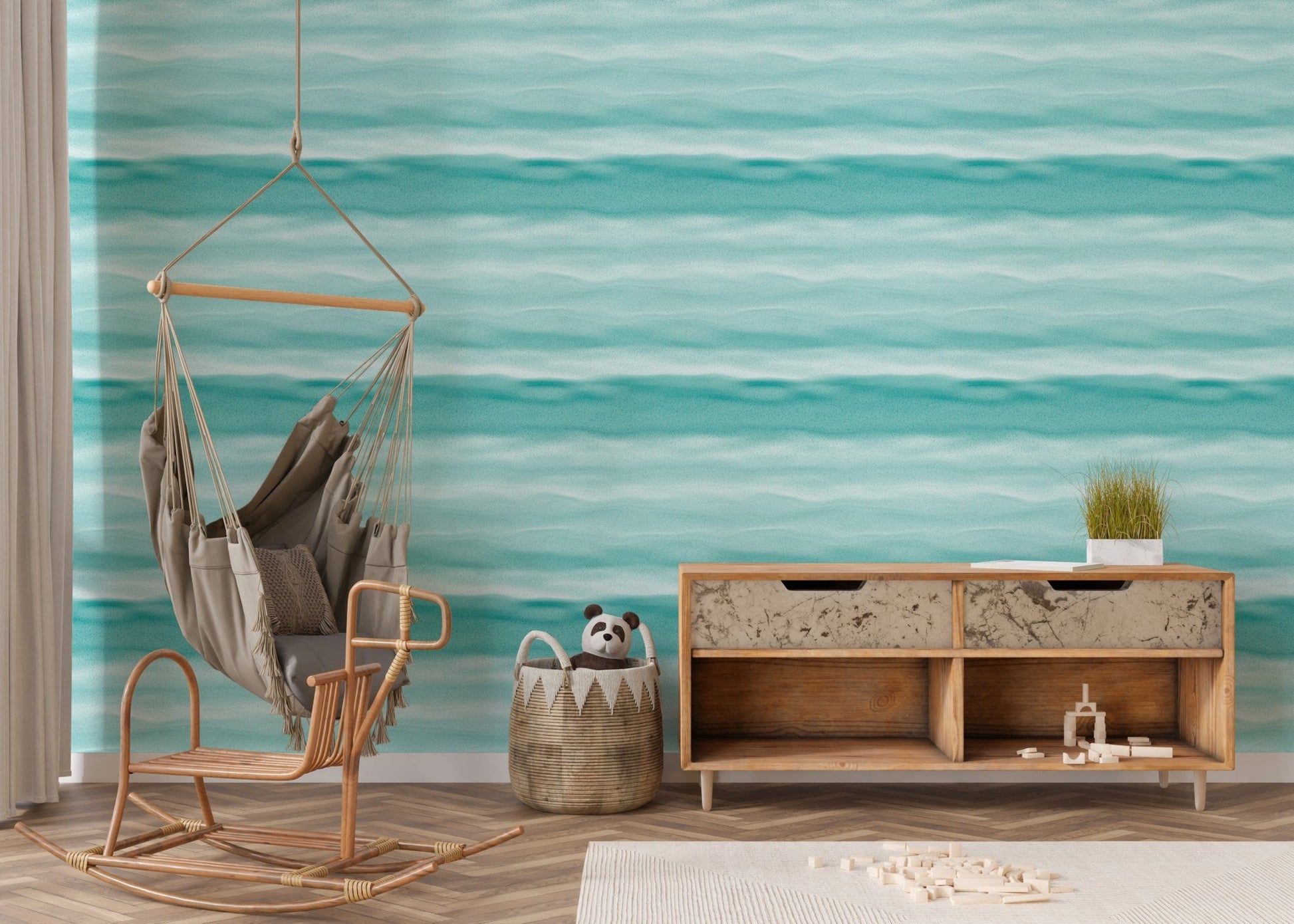 Marine texture wallpaper behind a wooden rocking chair n nursery.