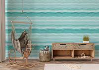 Marine texture wallpaper behind a wooden rocking chair n nursery.