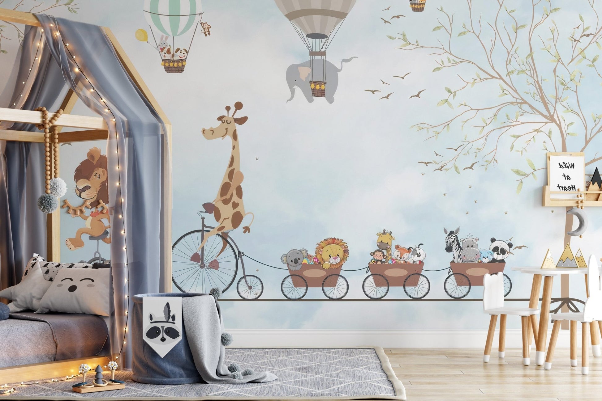 Aerial Animal Acrobats wall mural in a modern kids bedroom with a wooden bed.