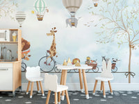 Aerial Animal Acrobats wall mural in a dining space with a small white table.