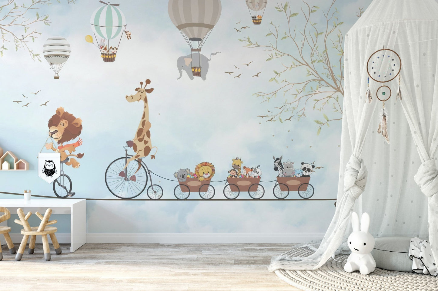 Whimsical animal wall mural in a bedroom featuring a white canopy tent and floor mat.