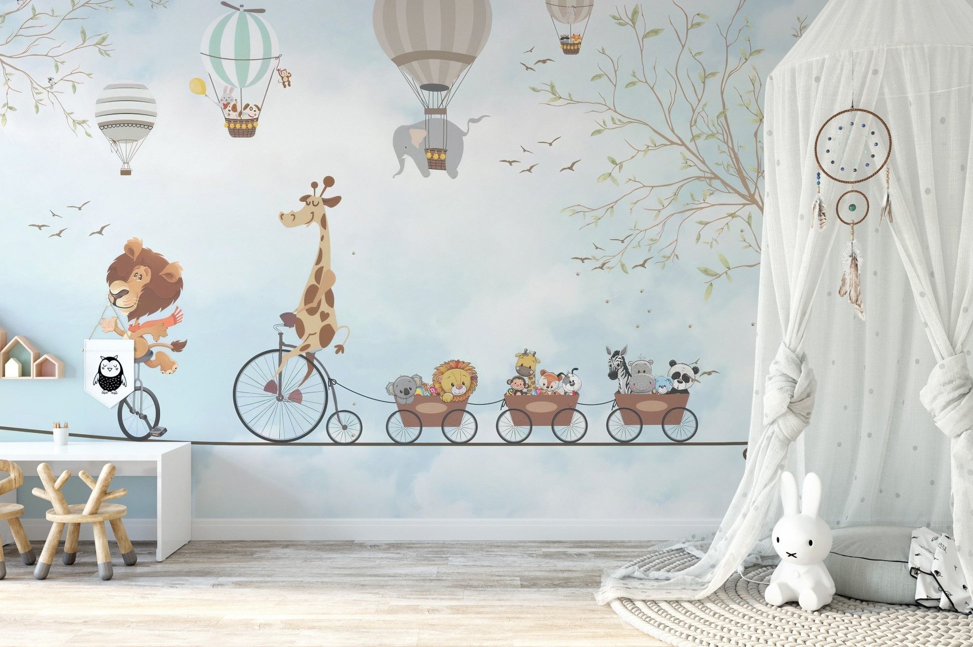 Whimsical animal wall mural in a bedroom featuring a white canopy tent and floor mat.
