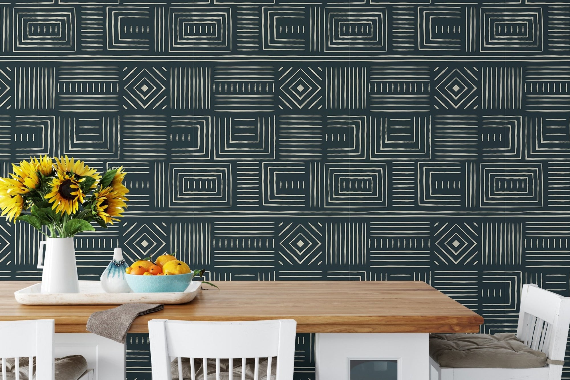 Green Africa Tribal Art Ethnic Geometric Wallpaper in a dining area with sunflowers.