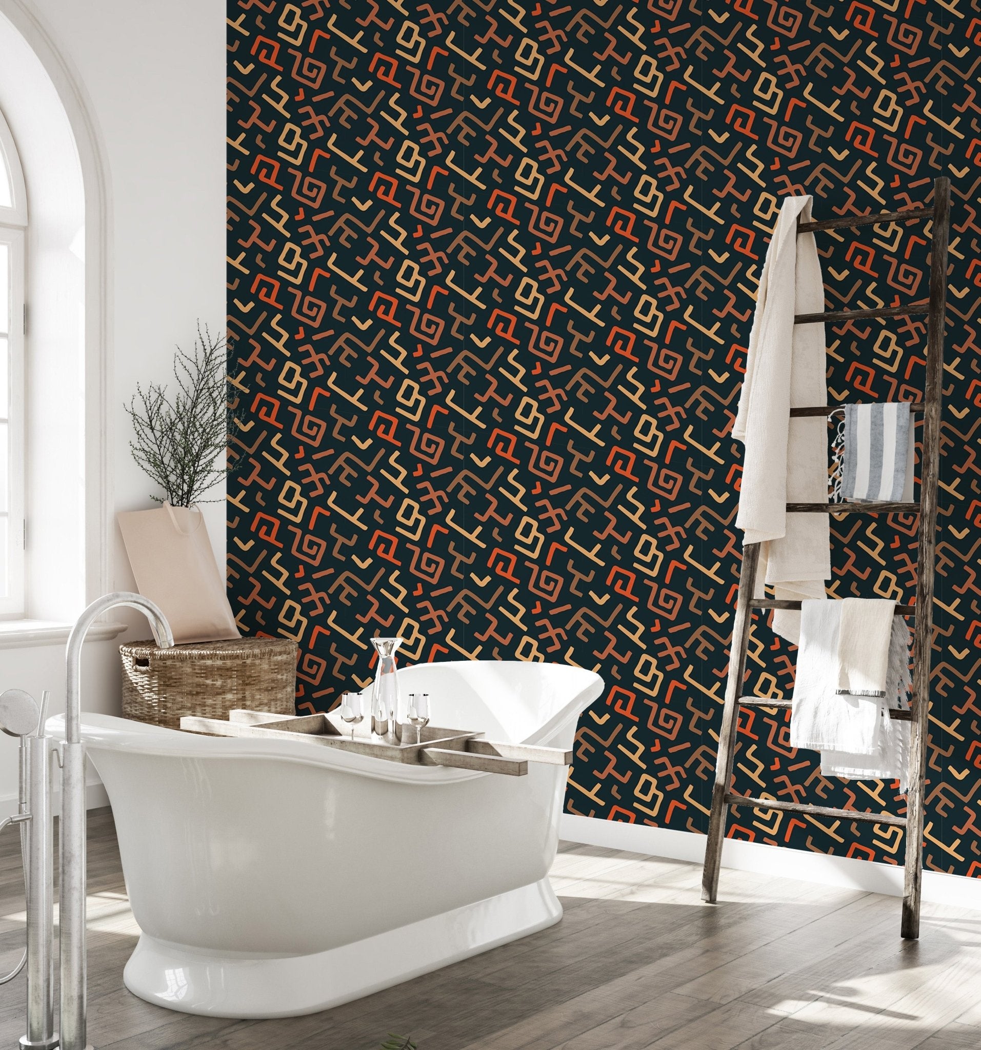 Luxury bathroom with freestanding tub and dark tribal art wallpaper.