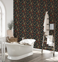 Luxury bathroom with freestanding tub and dark tribal art wallpaper.
