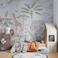 Elephant family and tropical foliage peel and stick wallpaper.