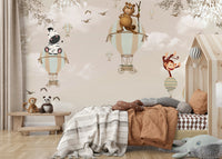 Bold sky scene on a large feature wall in a playroom.