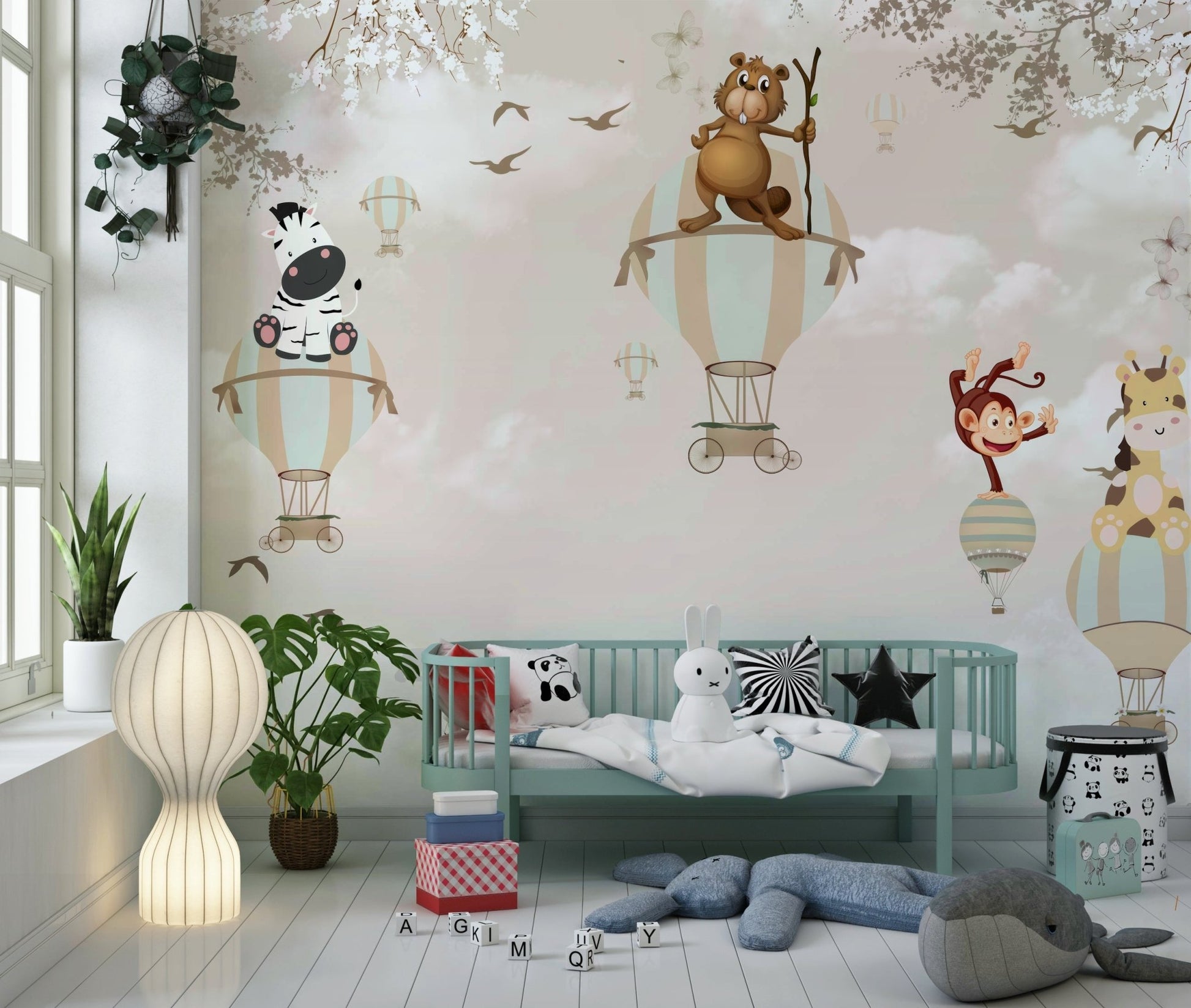 Nursery wall decor featuring soft cloud and vintage plane details.