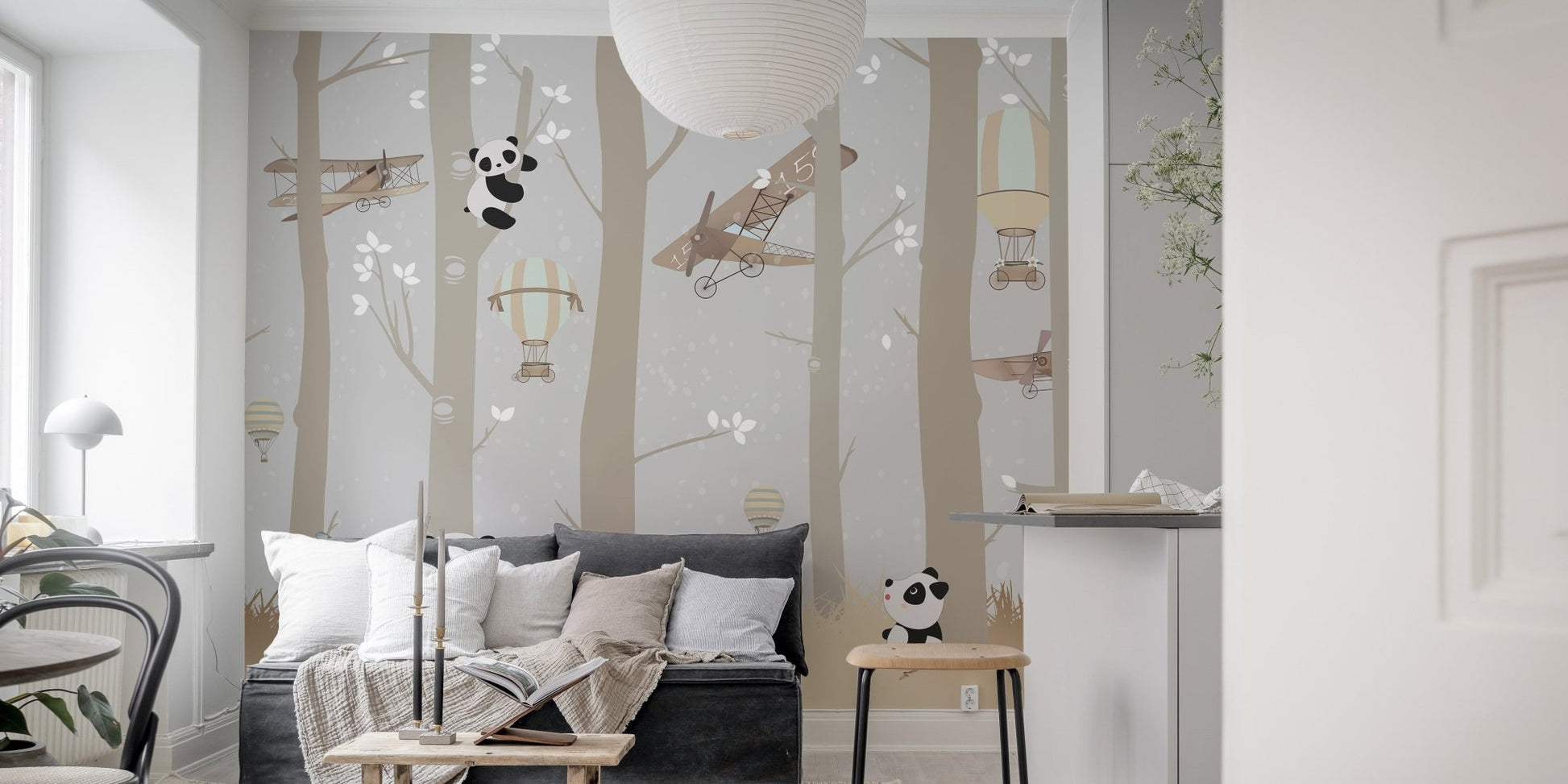 Airborne Pandas and Forest Delight Murals in a living room with a grey sofa.