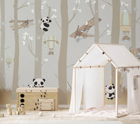 Airborne Pandas and Forest Delight Murals in a kids bedroom with a wooden house bed.