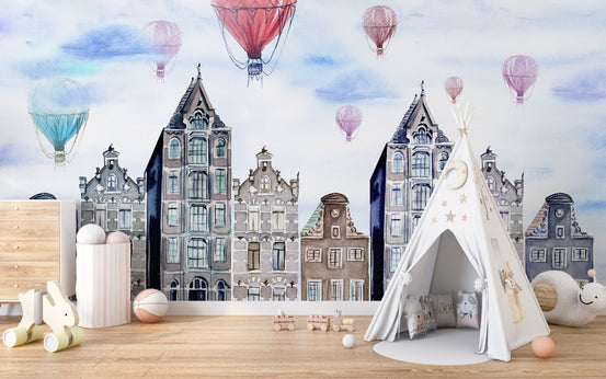 Amsterdam Hues Watercolor Cityscape Mural in a kids room with a white play teepee.