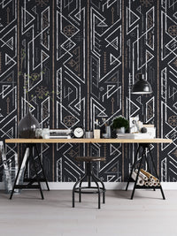 Home office setup with a long wooden table and Ancient Celtic wall mural.