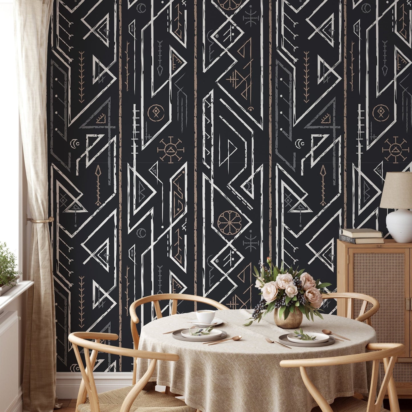 Round dining table set in a room with Ancient Celtic geometric wallpaper.