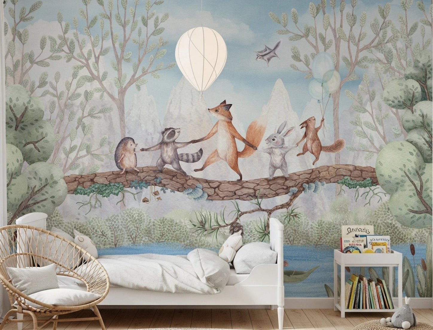 Kids bedroom with an illustrated animal and lake wall mural.