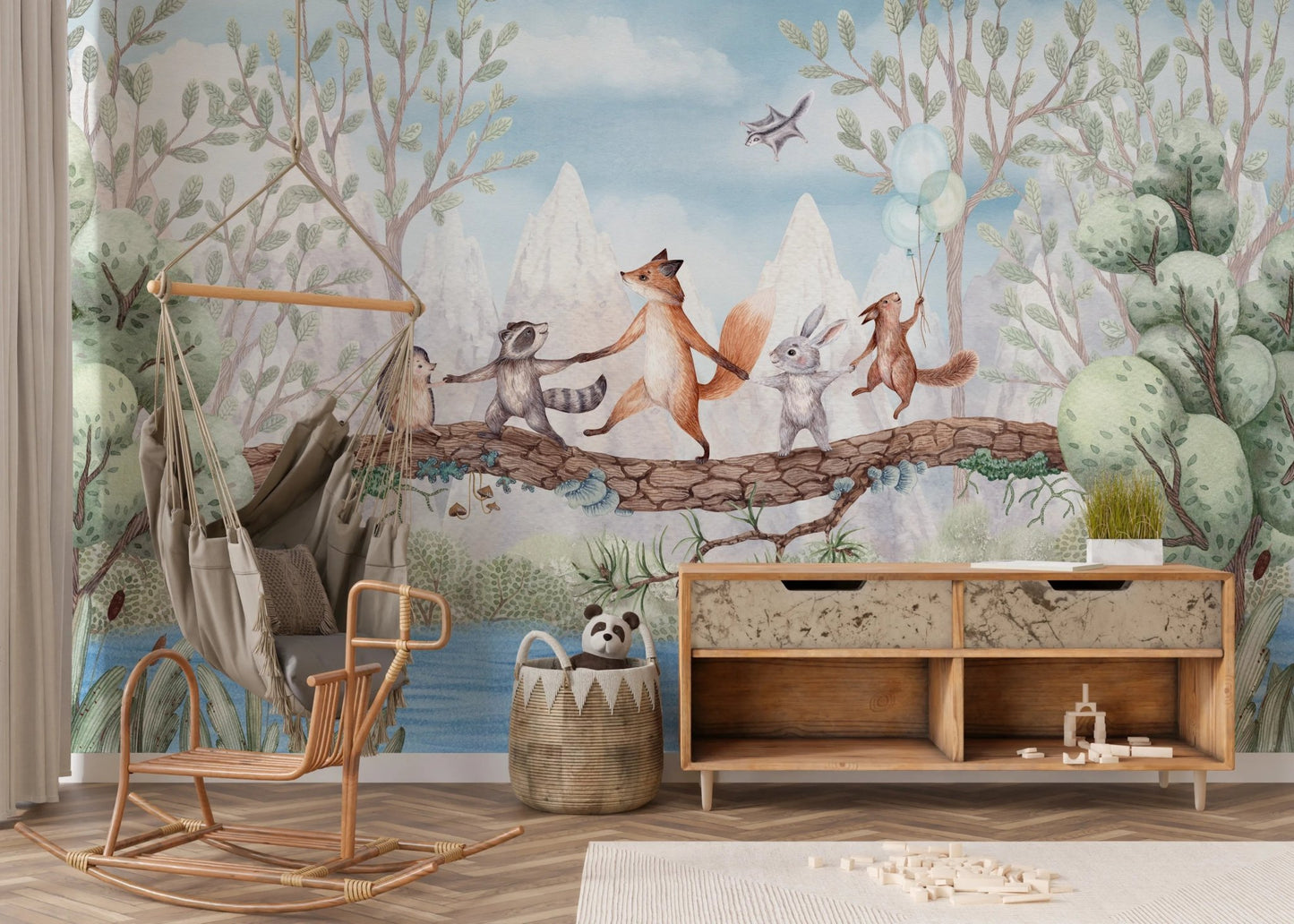 Toddler space with a wooden cabinet and animal adventure wall mural.
