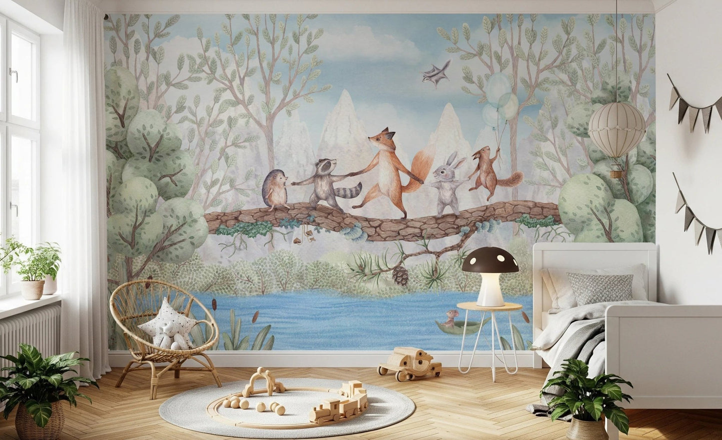 Sunlit bedroom showing a nature themed animal wall mural and wooden floor