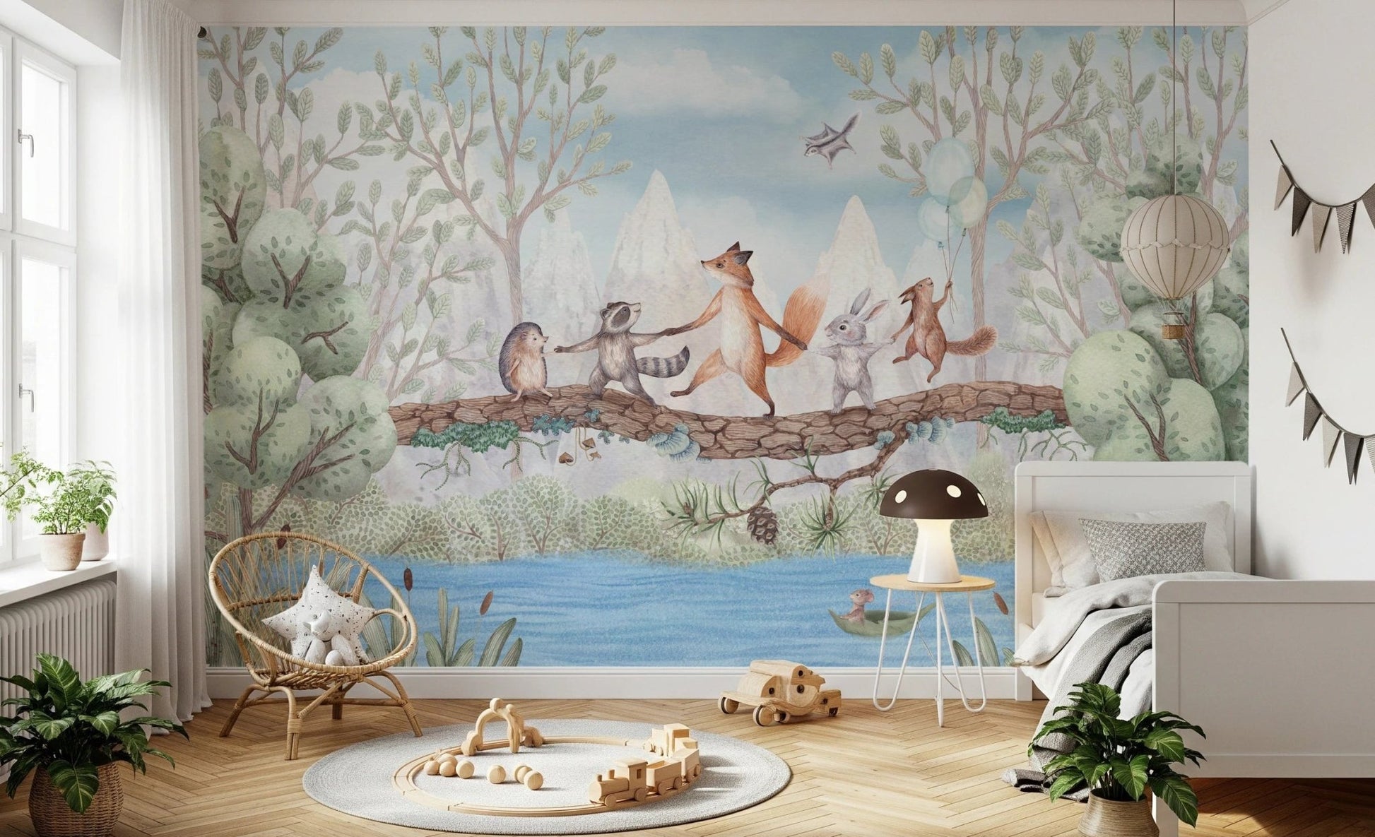 Sunlit bedroom showing a nature themed animal wall mural and wooden floor