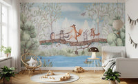 Sunlit bedroom showing a nature themed animal wall mural and wooden floor