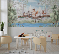 Animal Adventure Wall Mural in a playroom with wooden chairs and white table.