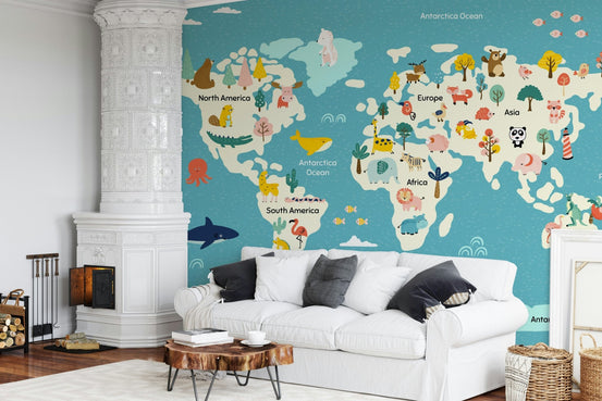 Playroom wall mural featuring colorful continents and regional wildlife illustrations.