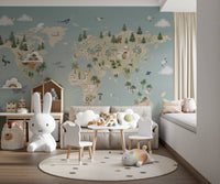Minimalist playroom featuring a white rabbit chair and blue world map wall mural.
