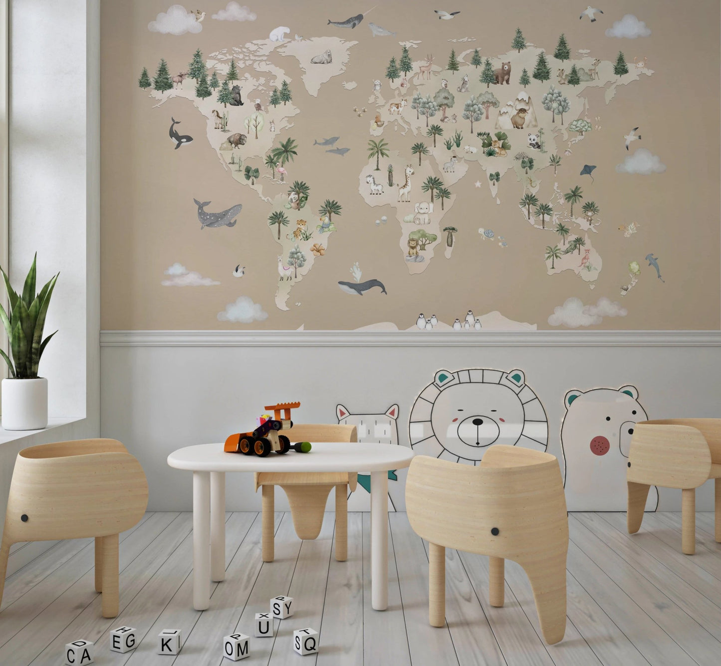Study area featuring a brown world map wall mural with green pine tree accents.