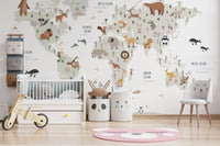 Animal-themed world map mural in soft white hues
