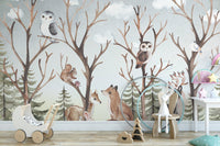 Animals in a tropical forest wall mural design for modern nursery.