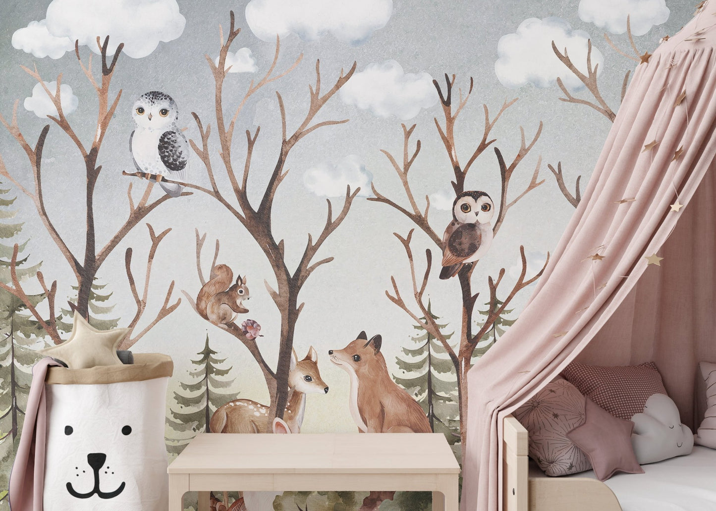 Minimalist nursery wall mural showing forest animal near a pink bed canopy.