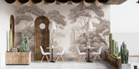 Etched forest wall mural in a commercial cafe space with white furniture.