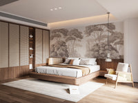 Sepia forest wall mural behind a large bed in a modern bedroom.