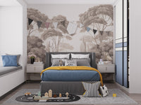 Monochrome forest wall mural in a kids bedroom with blue and yellow accents.