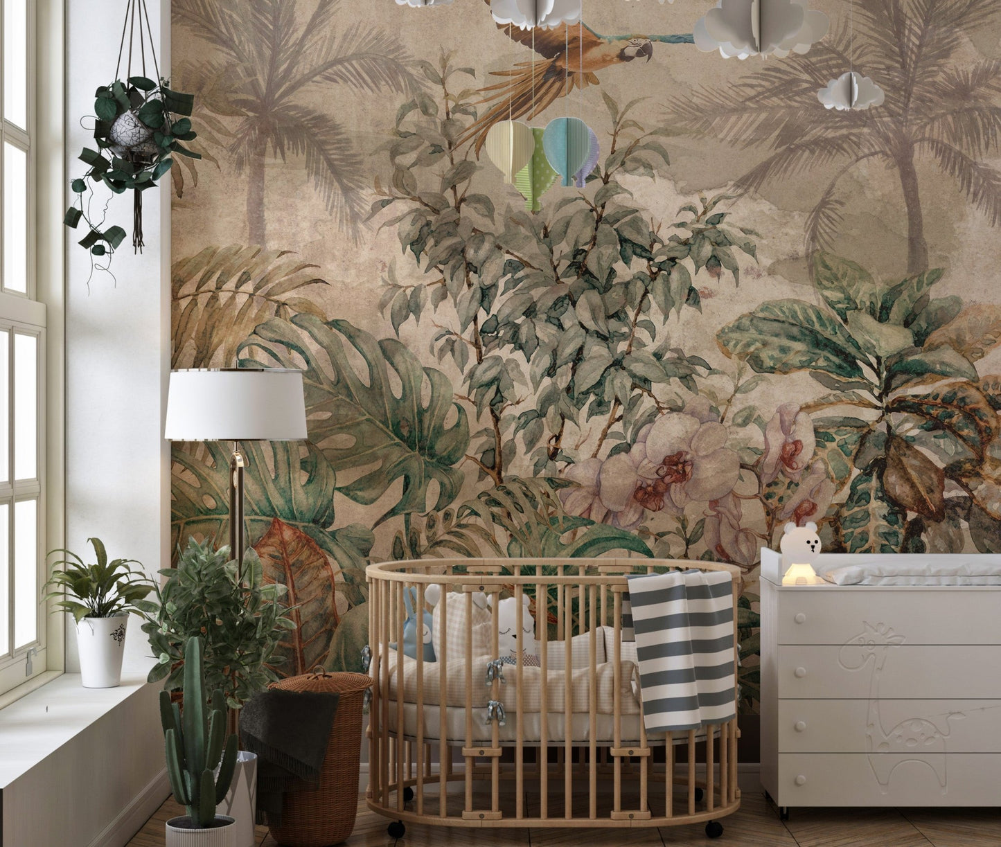 Nursery room with wooden crib and antique jungle themed wall mural.
