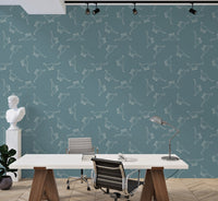 Large office wallpaper with white dinosaur outlines on a teal blue background.
