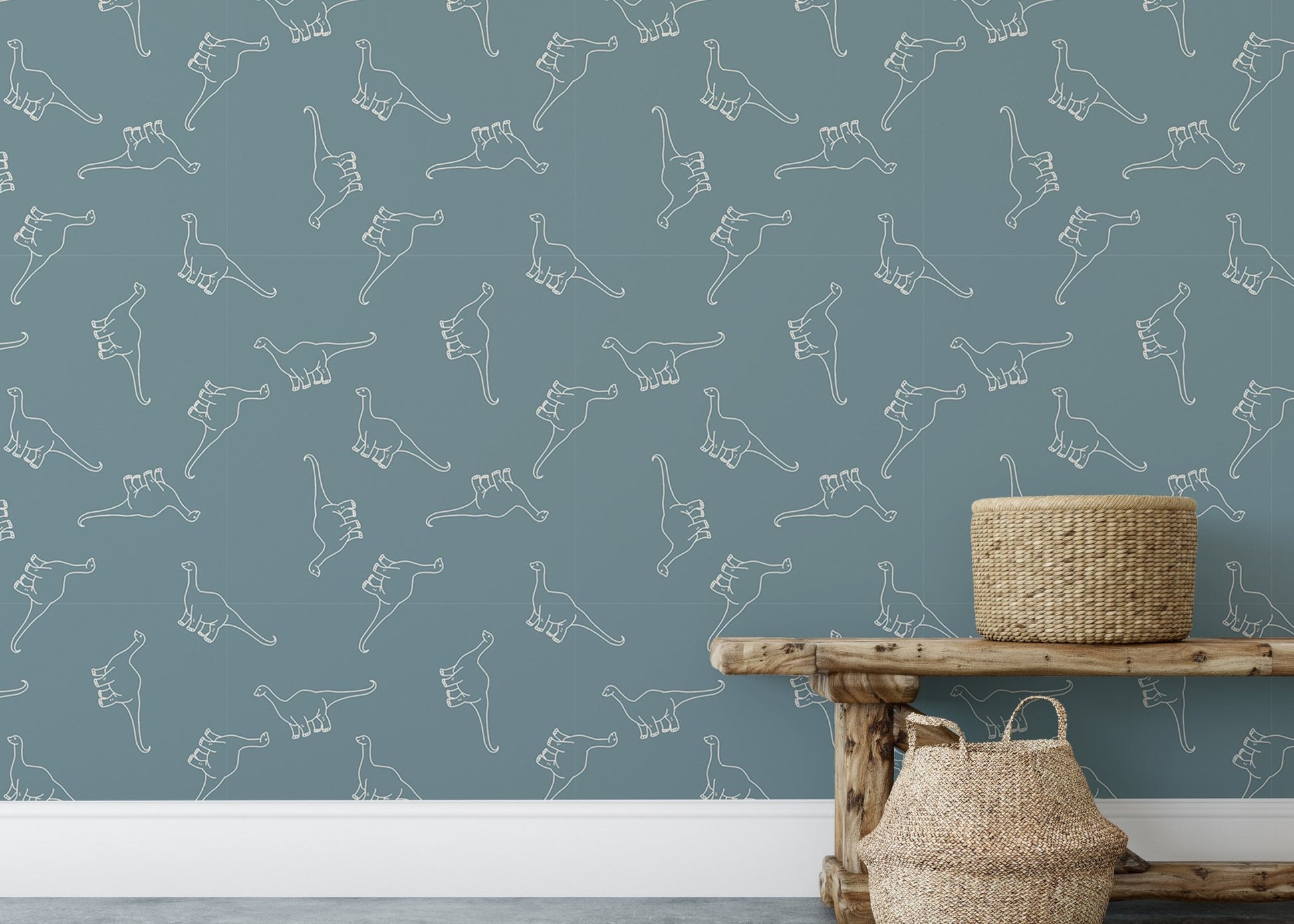 Seamless dinosaur wallpaper in a hallway with a rustic wooden bench and woven baskets.